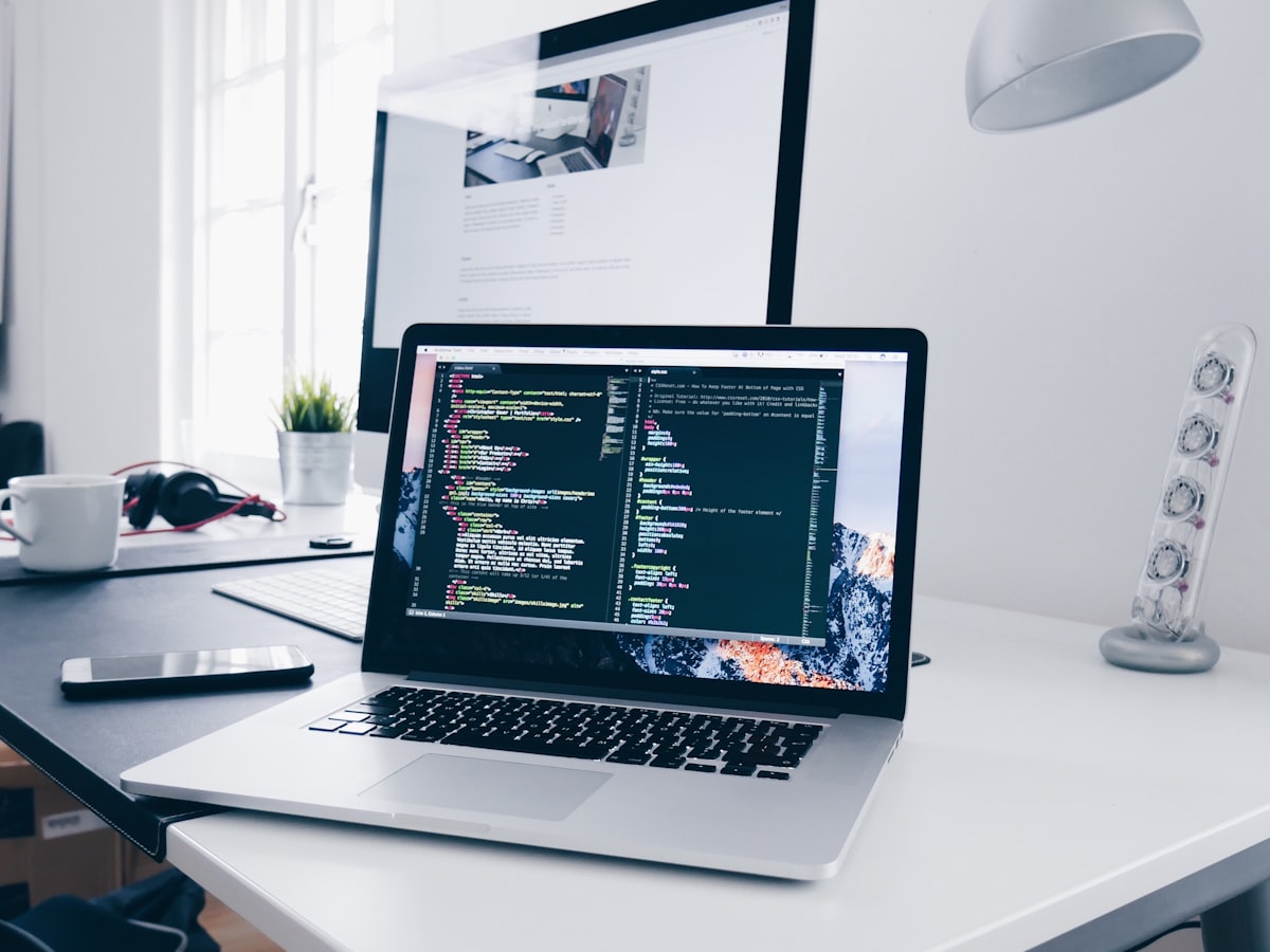 A laptop open on a clean, well-lit desk